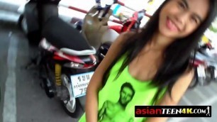 Sexy Asian teen knows how to take care of tourists properly... With a blowjob!