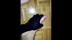 Black Gloved Hand Playing with Teen Boy Feet
