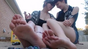 Two Friends Smoke And Show Their Feet