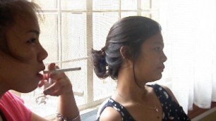 Two Asian Teens Smoking