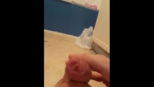 Barely legal teen jerks his cock in the bathroom