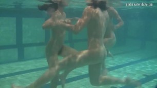Sexy young teens swirl in the water