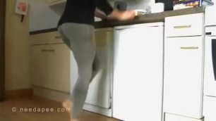 Bursting To Pee&comma; Sexy Lady Can't Hold It While Working In The Kitchen