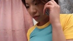Japanese teen sweetie in hot outfit having phone sex